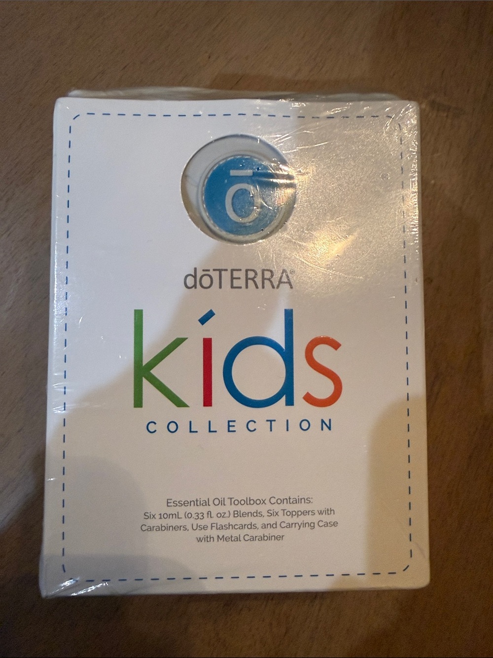 Doterra Kids Collection Box — set of 6 oils, 6 toppers, flashcards, carry case.